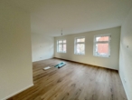 Erstbezug! Sanierte Maisonettewohnung in modernem Altbau - Wohnzimmer 2